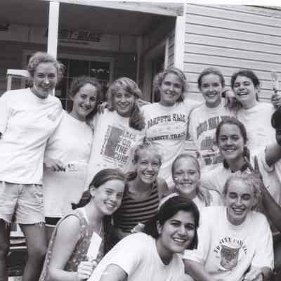 Class of 1998 in front of Habitat for Humanity house