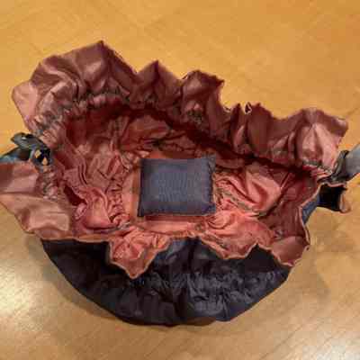 Drawstring pouch sewing kit, interior with pin cushion navy side shown