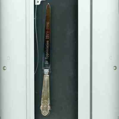 Stainless steel letter opener given to Sandra Davis