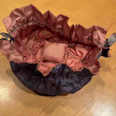 Drawstring pouch sewing kit, interior with pin cushion pink side shown