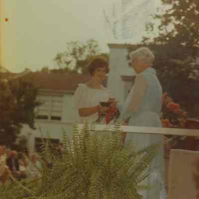 August 24, 1981 Dear Paula, How are you doing? I hope fine. Are you ready for another school year at Virginia? I'm pretty much ready for another year. This past freshman year has gone by pretty fast. It seems like only recently when we were going through graduation. As you can see this is a picture I took at graduation and have been meaning to give you but had forgotten. Sorry, it's taken so long. Take care. Love always, Norda: Paula Lynne Helm and Polly Fessey at Graduation, 1980
