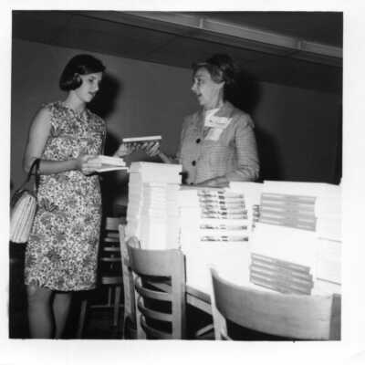 Student getting her text books at registration circa 1960.