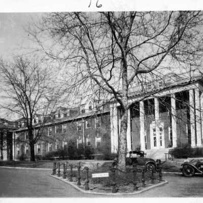 Picture of Ward-Belmont buildings with old cars visible.