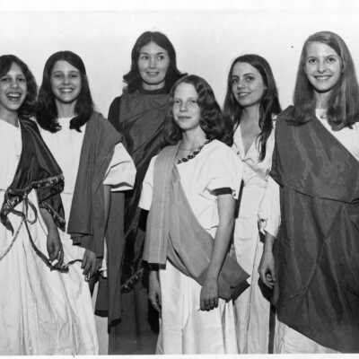 Girls dressed in togas.