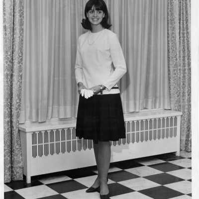 Louise Dortch class of 1966 poses in Souby Hall.