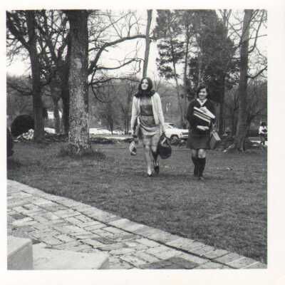 Students carrying books, 1960s