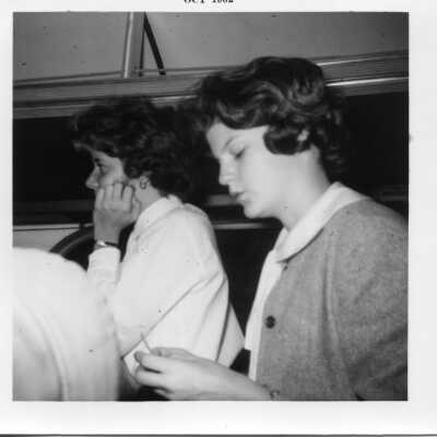 Students on bus in 1962. Possibly a school trip.