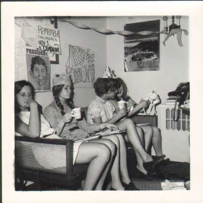 Students wearing party hats, 1969