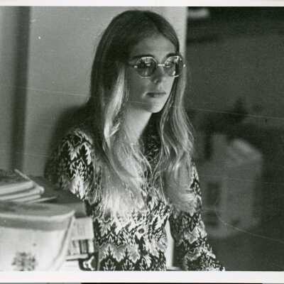 A student in a candid pose (not in uniform) wearing sunglasses in the 1970's.