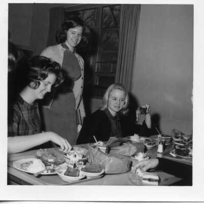 Students enjoying lunch in the cafeteria in 1963.