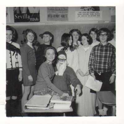 Students pose with Santa Claus, 1960s