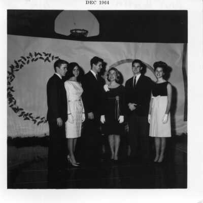 Ann Martin, Caroline Ligon, Jeanie Nelson with escorts at a T Dance in December 1964.