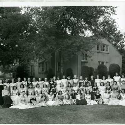 Large group shot of 54 ladies in formal dress on the Ward-Belmont campus