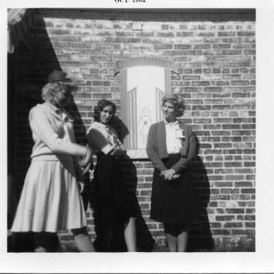 Senior students hanging out by the senior house.