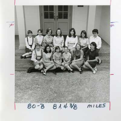 Class of 1973 in the 1970's sitting on the steps of the middle school.
