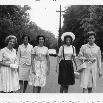 Five well dressed students outside (not HH campus) in May of 1964.