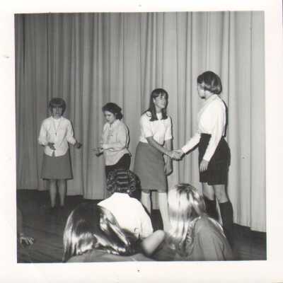 Students on stage, 1960s