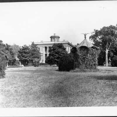 Ward-Belmont or Belmont College. Same age as 2014.314. Building, statues and gazebo visible.