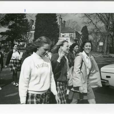 Students in parking lot, 1970s