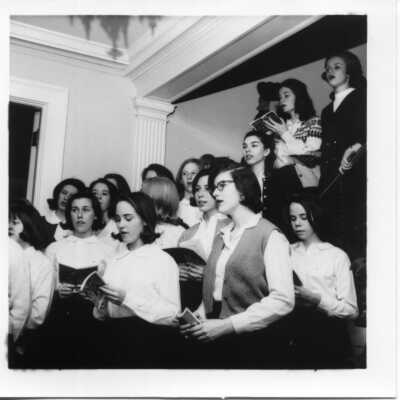 Students singing on stairs in Souby