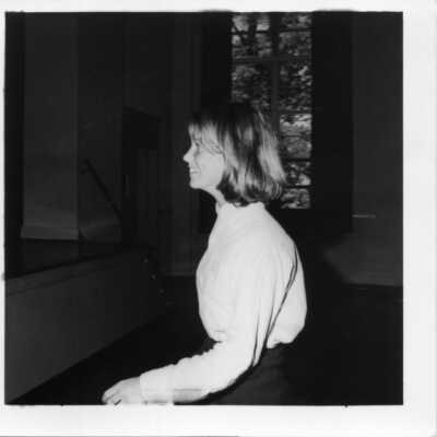 Student in auditorium circa 1960.