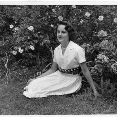 Senior Betty Moughon poses for her senior superlative as "Most in Love." She was class of 1960.