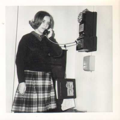 Edna Wade Presley using a pay phone, 1968