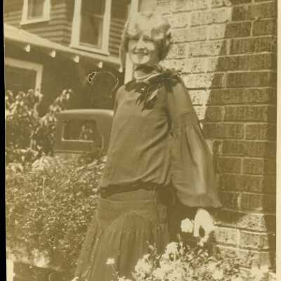 Ward Seminary or Ward-Belmont Student Posed Outside a Brick Home