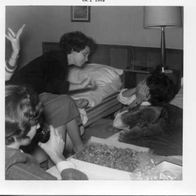 Students in hotel room possibly on a school trip in 1962.