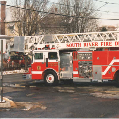A modern fire truck on the day of the parade.