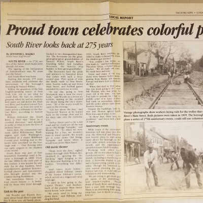 Newspaper clipping, "Proud town celebrates colorful past."