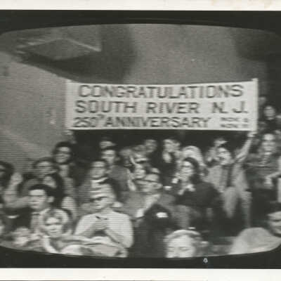Johnny Carson audience with South River banner