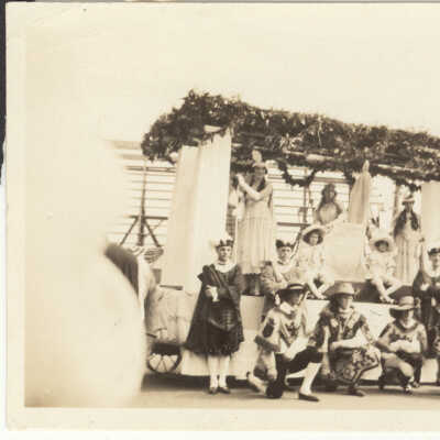 Queen Riverie and Her Court Posed on the Parade Float