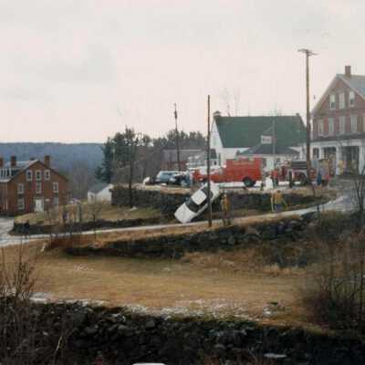 Car over the wall at General Store
