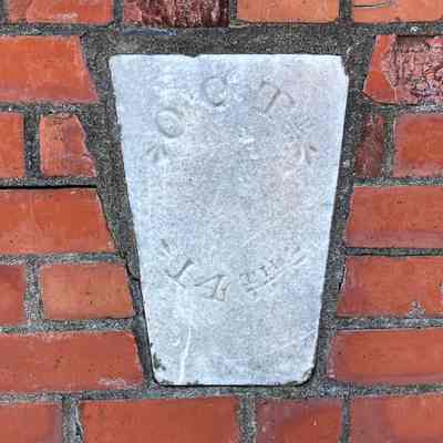 Marble tablet (Oct. 14th) on Masonic Tomb between the two tomb entrances. Photograph by Hugh French, January 17, 2025.