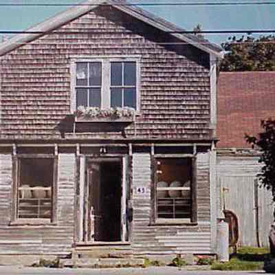 Photograph 43Key5. From Pat & Sven Oftedal. Photograph given to Pat & Sven Oftedal from previous owners, Brenda White and Jesse Rhodes, and taken before they renovated the outside of the building in the early 1990s.