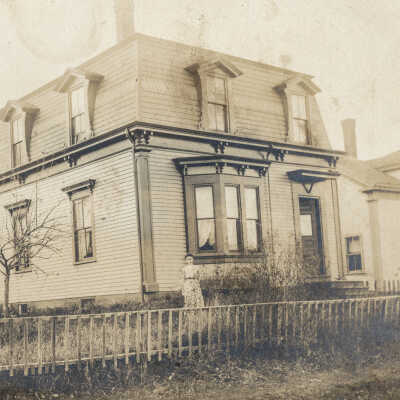 Mary Ann Mitchell?: Taken c. 1910. Possibly Mary Ann Mitchell in front of home of Thomas and Mary Mitchell