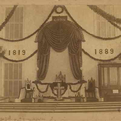 Interior of Congregational church in 1889 before balcony was enclosed.