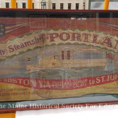https://mainehistory.pastperfectonline.com/webobject/A47627BF-C122-46E5-B672-504646105627
Steamsip Portland sign
Object #	2019.346
Description	Wood painted sign carved at the sides. The large piece of wood is painted (probably on both sides but it is framed). THe top of the sign has a crude light house at each top, a stylized american flag and a british flag. Under this it reads "The Steamship Portland" and a picture of the steamship. Under the boat it reads "From Boston via Portland*Bangor*Eastport*Calais to St John, NB Can" "Leaves each Thursday at 4:00 am from Rowe's Wharf" "Captain R. Walker Moody"

The piece is framed in a heavy frame, could come out at some point