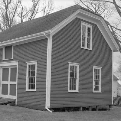 Barn behind the house. Photograph by Thaddeus Holownia.