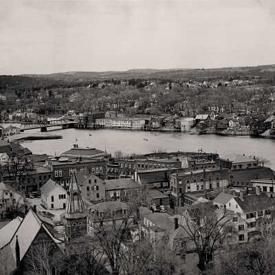 Downtown Calais, Maine with St. Croix River and St. Stephen, New Brunswick | [No Artist Defined]