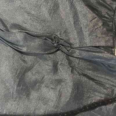 Detail of sleeve elbow fabric gathers