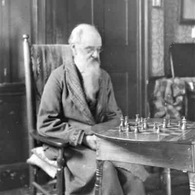 Samuel F. Moody playing chess