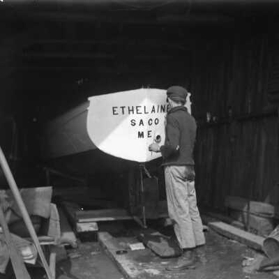 Painting the boat Ethelaine