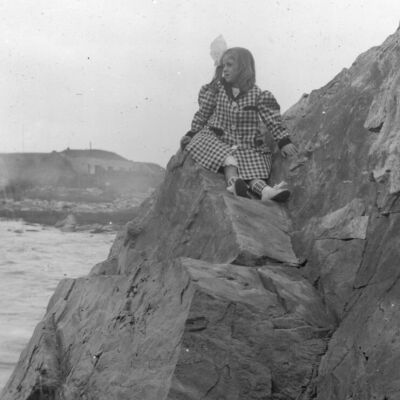 Girl in plaid coat, Cape Cottage, ME