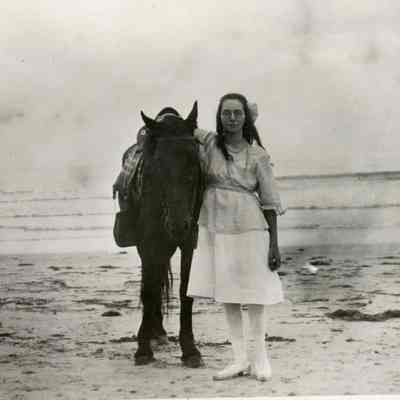 Young woman with a horse on Old Orchard Beach