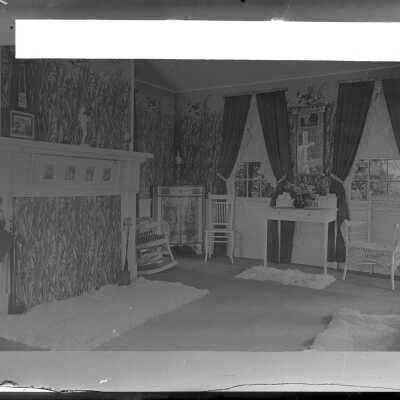 Reverse side with section of postcard pasted on.