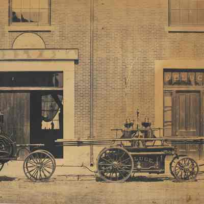 Photo print found in the collection showing the side of City Hall when the Deluge No. 4 occupied the building.