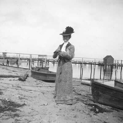 Woman Standing Near Wharves at Highlands Beach, NJ
