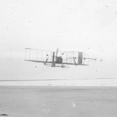 Biplane flying over Old Orchard Beach